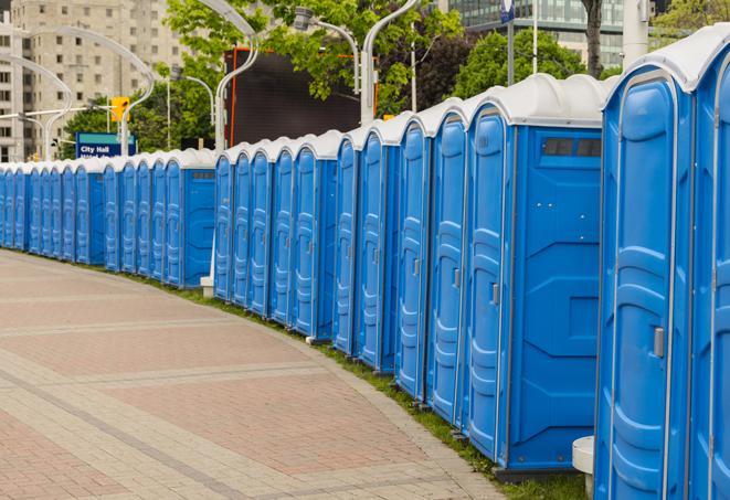 a row of portable restrooms at a fairground, offering visitors a clean and hassle-free experience in Alexander, AR